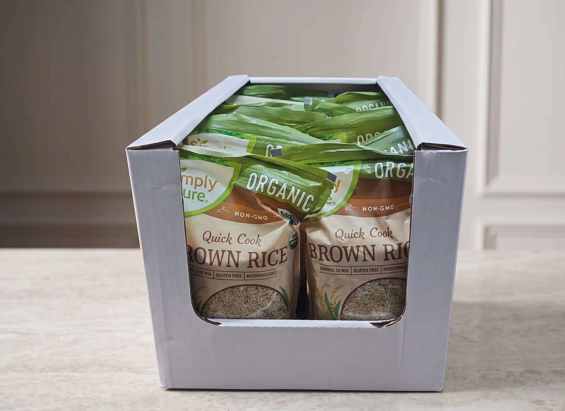 White-lined shelf-ready tray filled with brown rice pouches